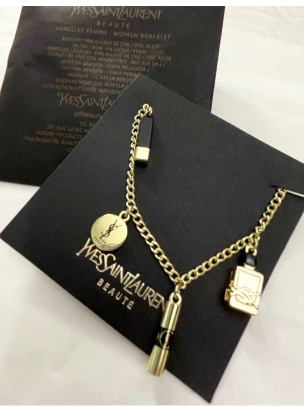 YSL Beauty gift phone chain